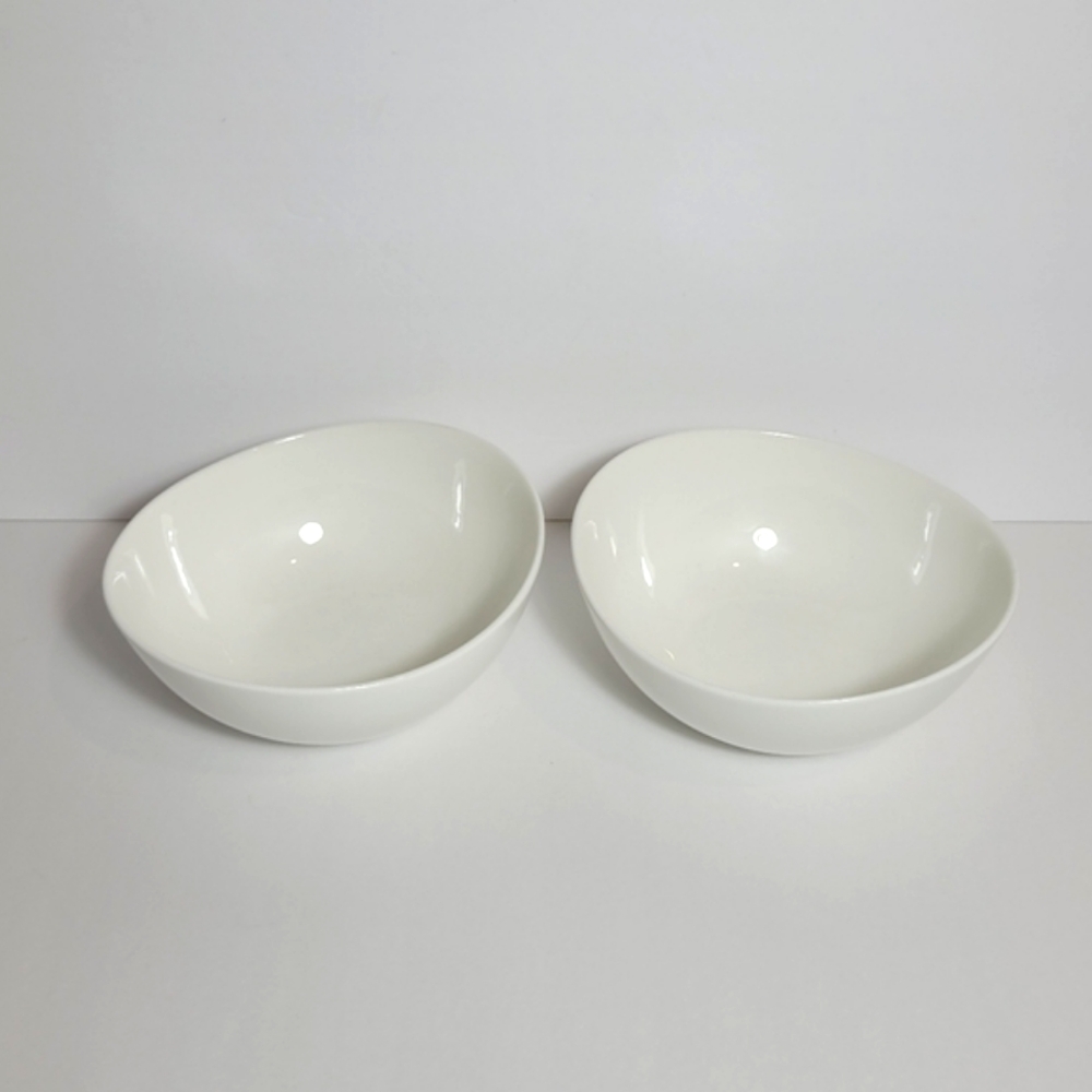 Chic All White Porcelain Oval Bowls with Uneven Rim Set of Two Bowls